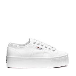 Platform sneaker with textured toe bumper and rubber sole.
1 1/2" heel